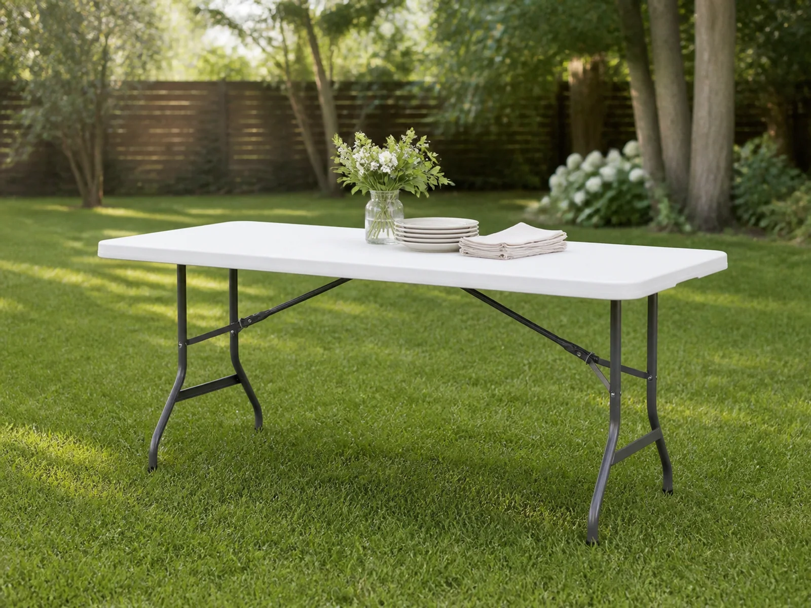 MANXI 6FT folding table in an outdoor gathering
